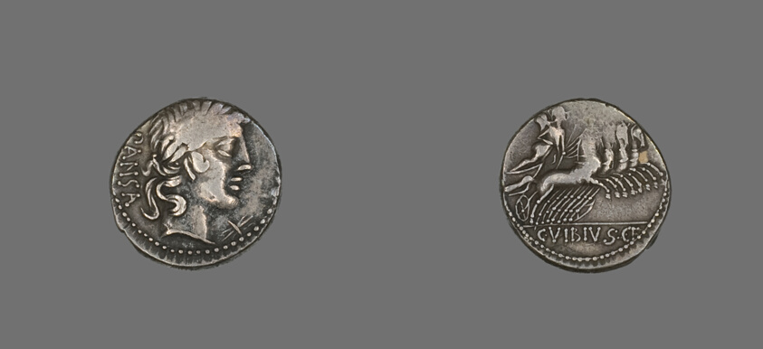 Silver coin with a face in profile on one side, a figure riding a chariot pulled by four horses on the reverse.