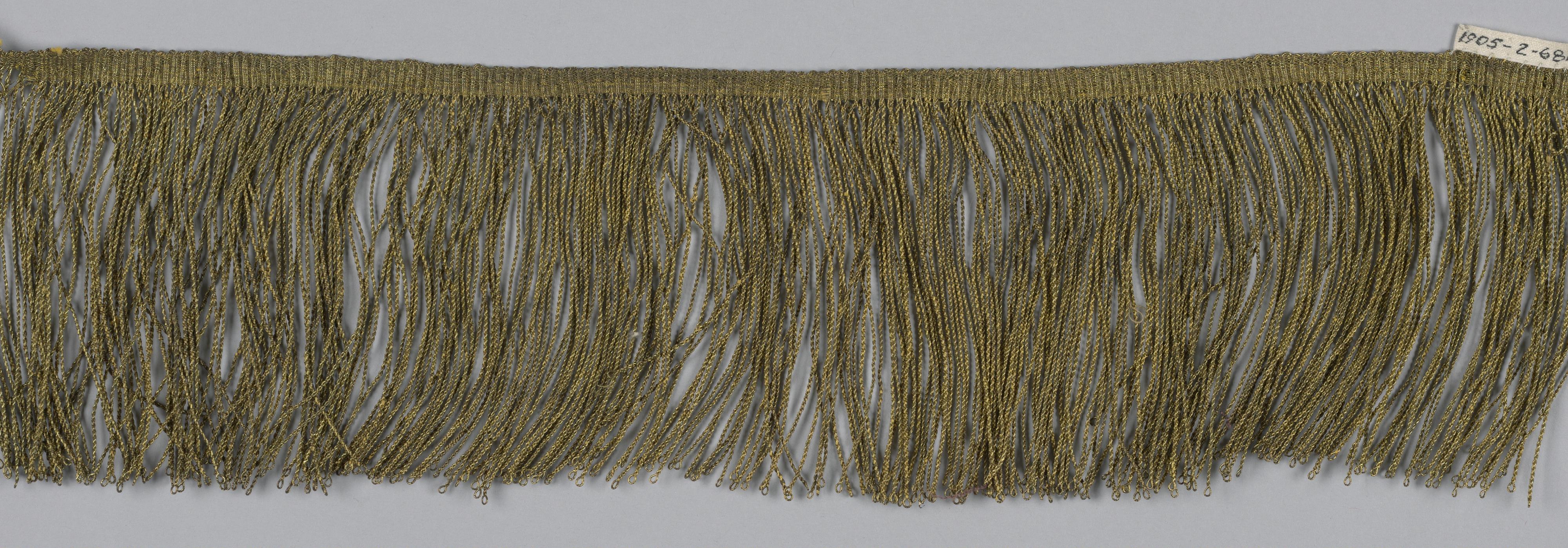 Fringe — Fringe. Medium: gilt foil on a silk core Technique: woven.