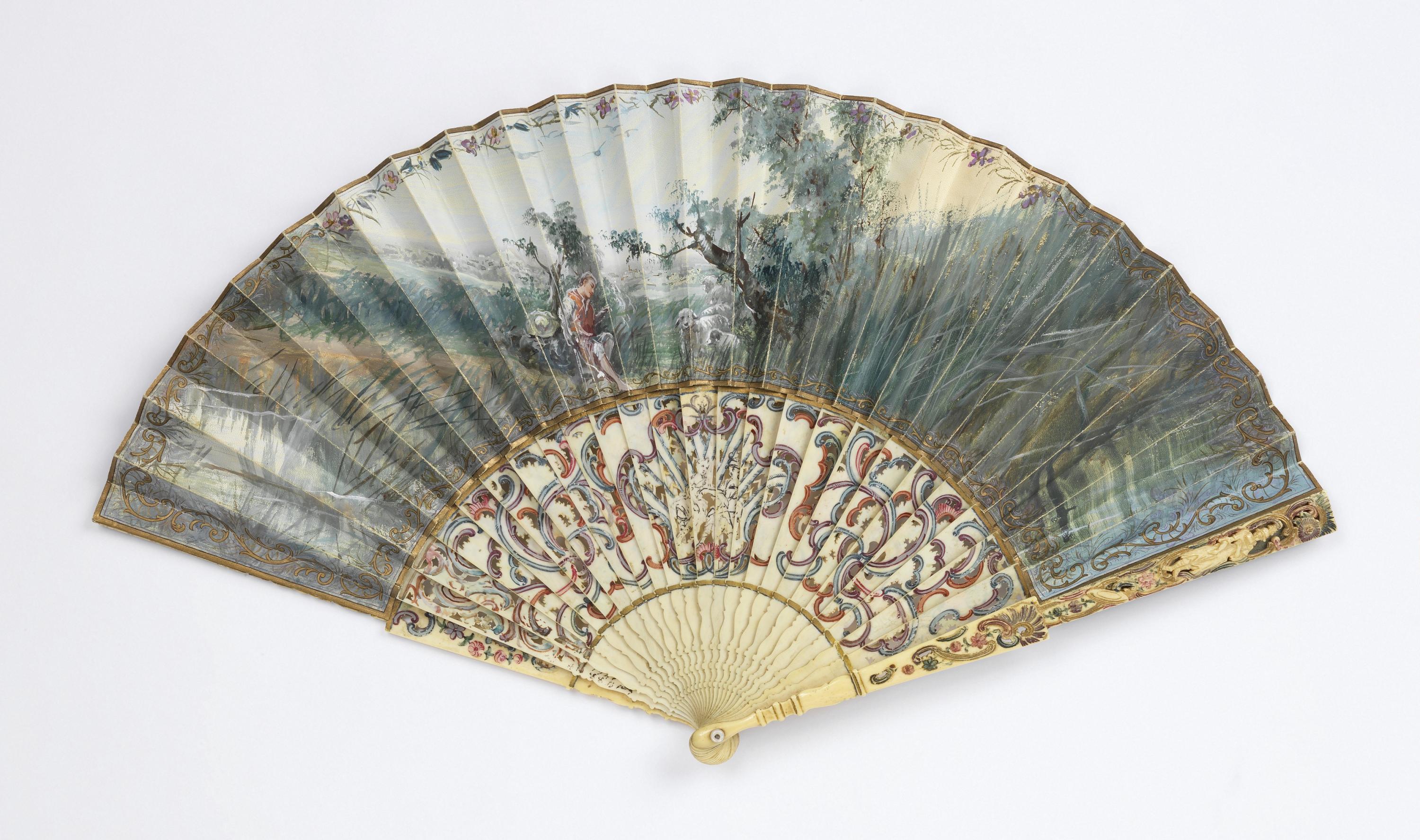 Pleated fan — Pleated fan. Parchment leaf gilded and painted with gouache, pierced, carved and painted ivory sticks.