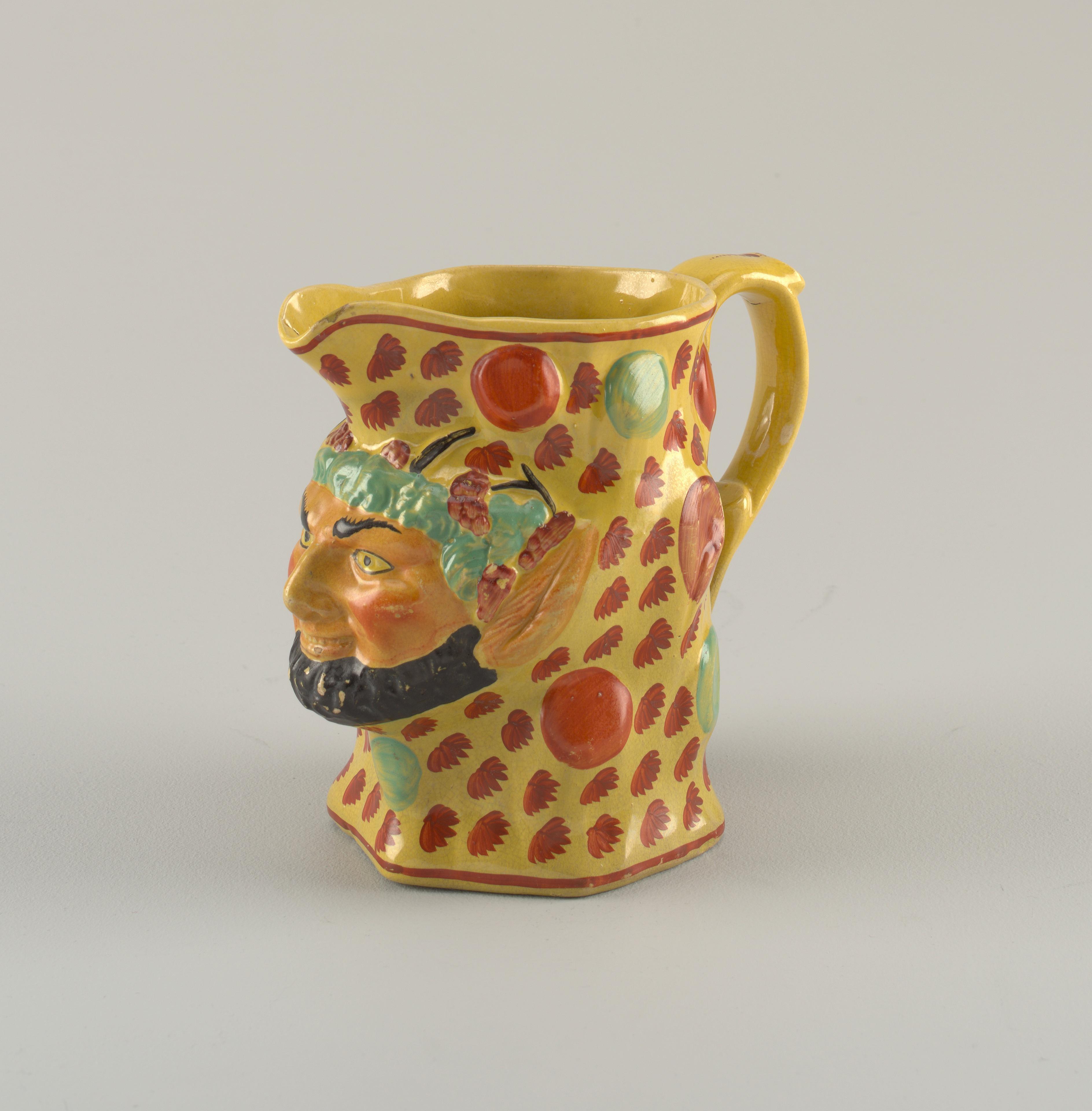 Jug — Jug. Yellow-ground and multi-colored painted decoration on molded stoneware.