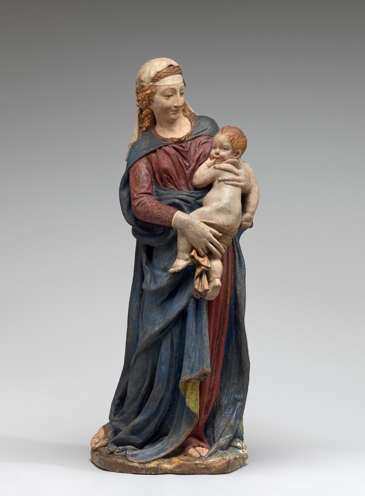 Madonna and Child — Sculpture by Donatello and Workshop. painted and gilded terracotta.
