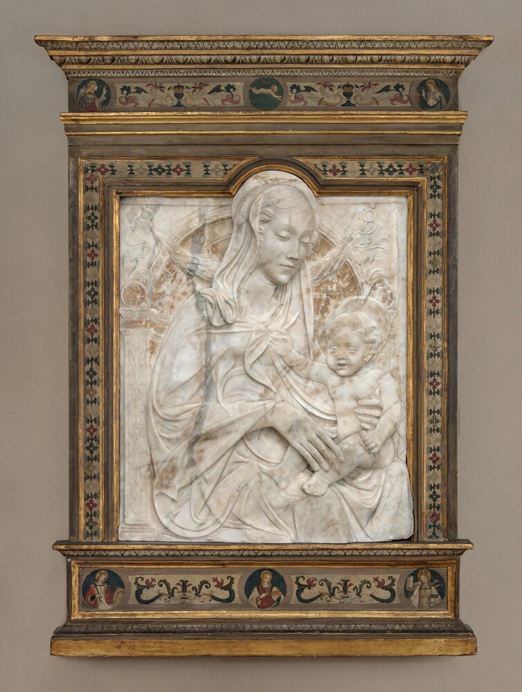 Madonna and Child — Sculpture by Style of Agostino di Duccio. marble.