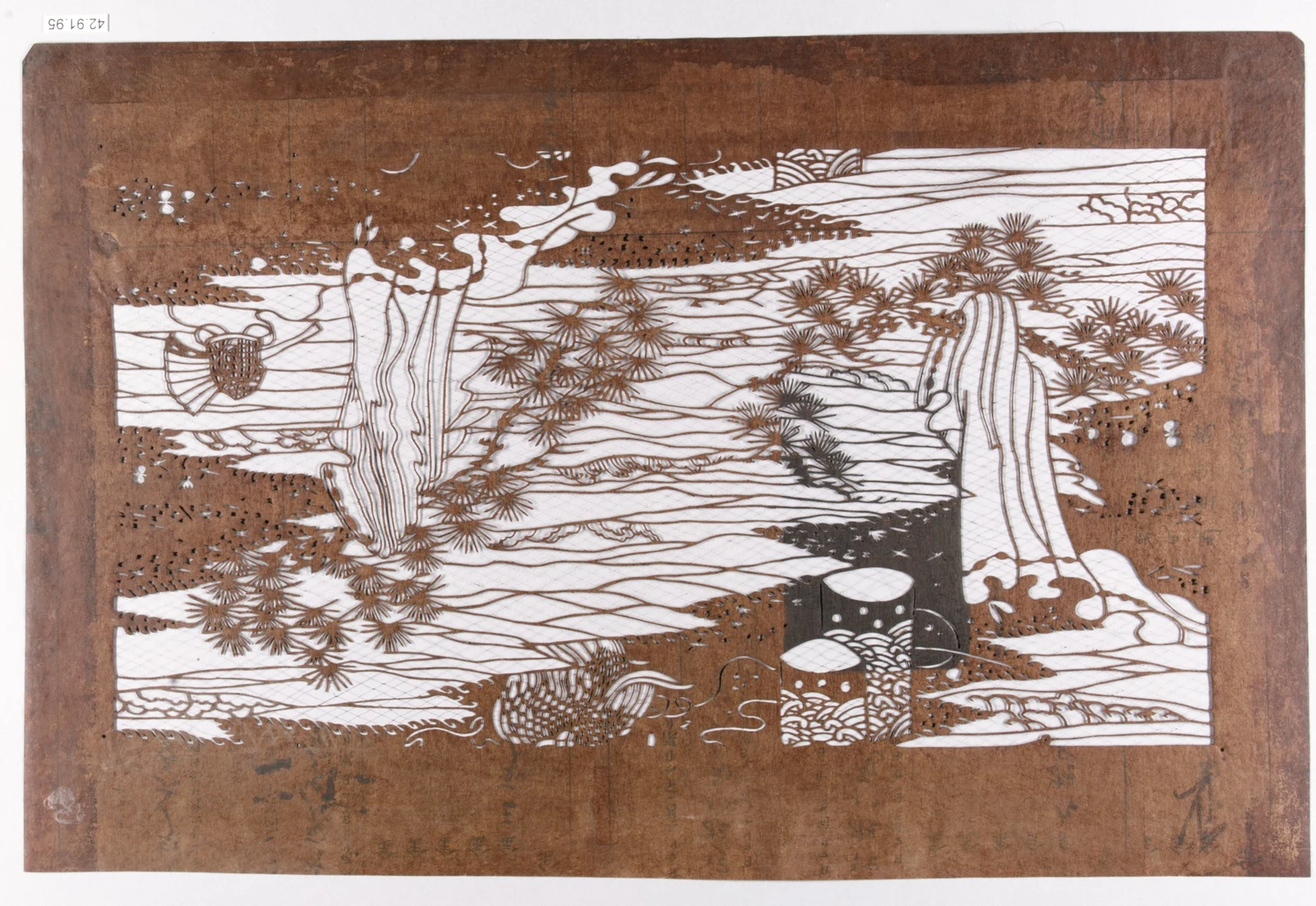 A cut-paper pattern arranges dark and light shapes for repeated transfer.